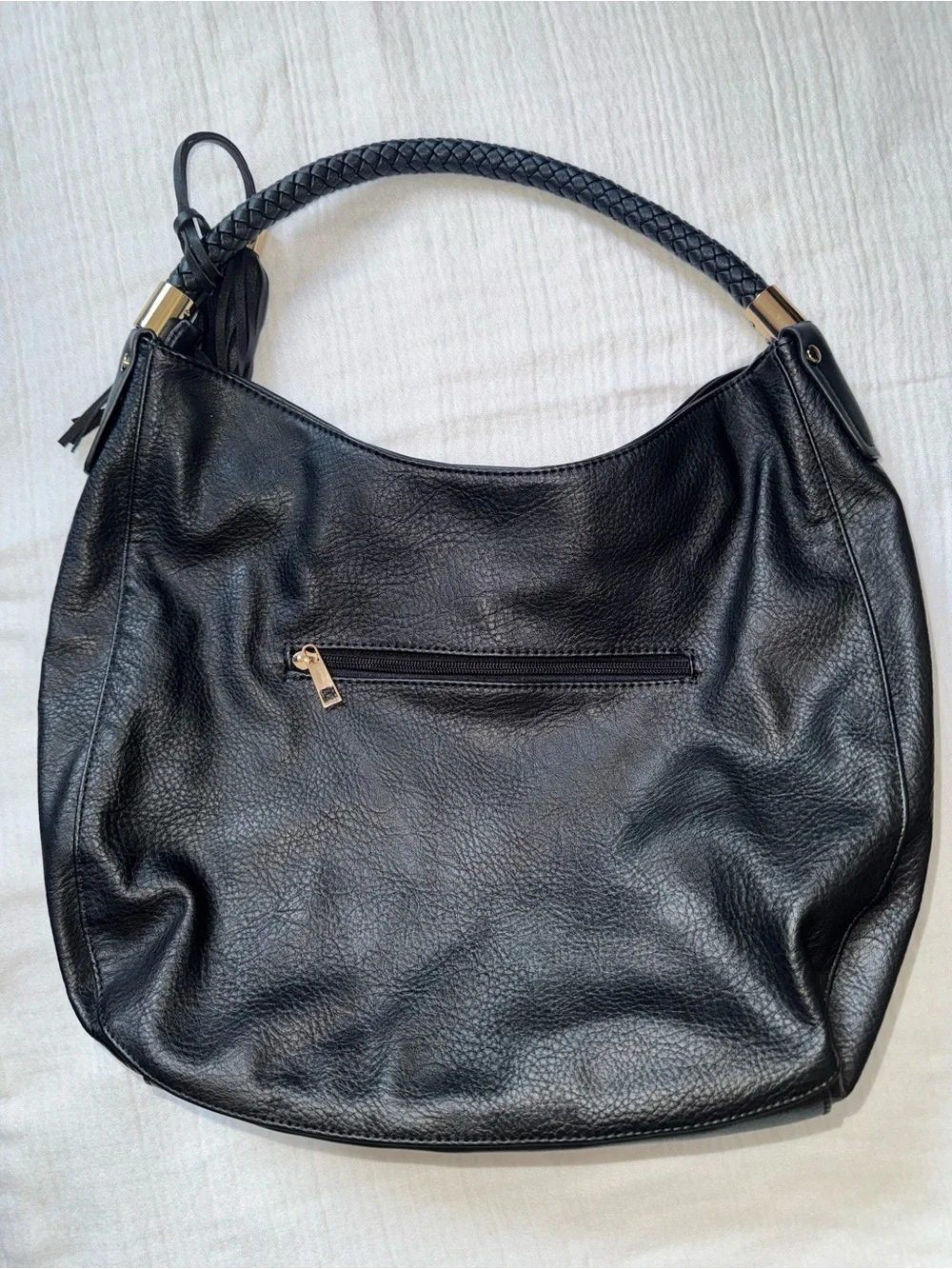 Black Leather Hobo Bag with Braided Handle and Tassel